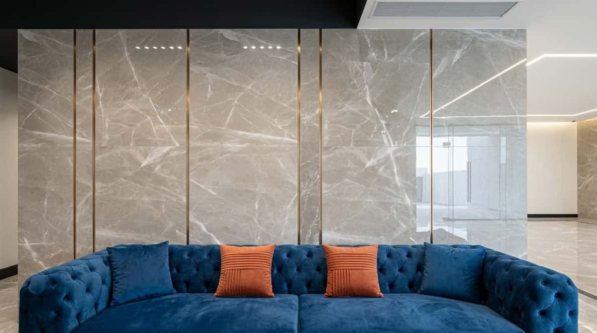 Turkish beige-grey marble wall panels with soft lightning-like veining Turkish beige-grey marble wall panels with soft lightning-like veining