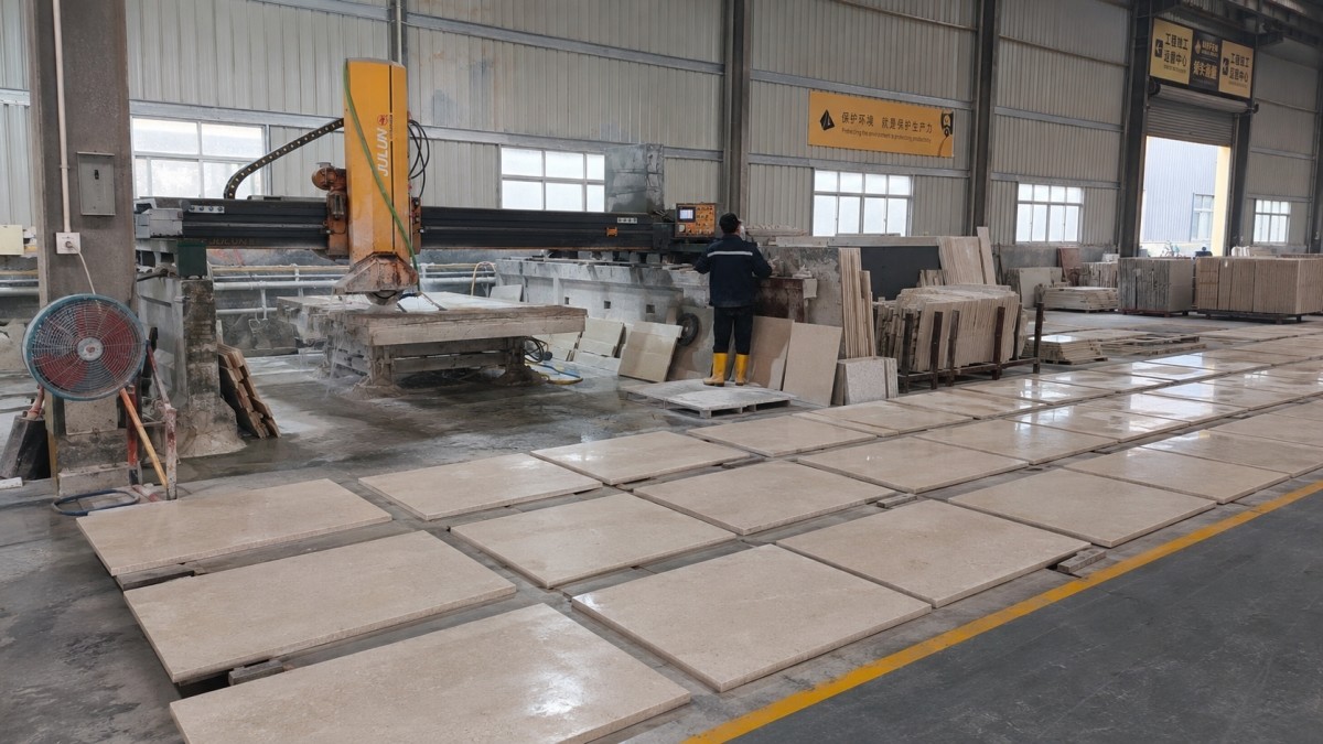 Cut-to-size stone flooring pieces prepared in a factory for a commercial project