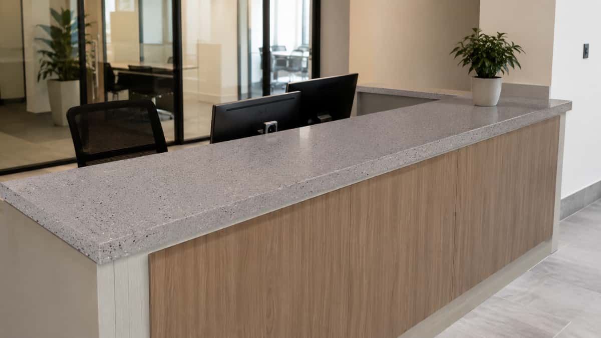 low-maintenance-grey-artificial-marble Low maintenance grey artificial marble for interior reception desk surfaces
