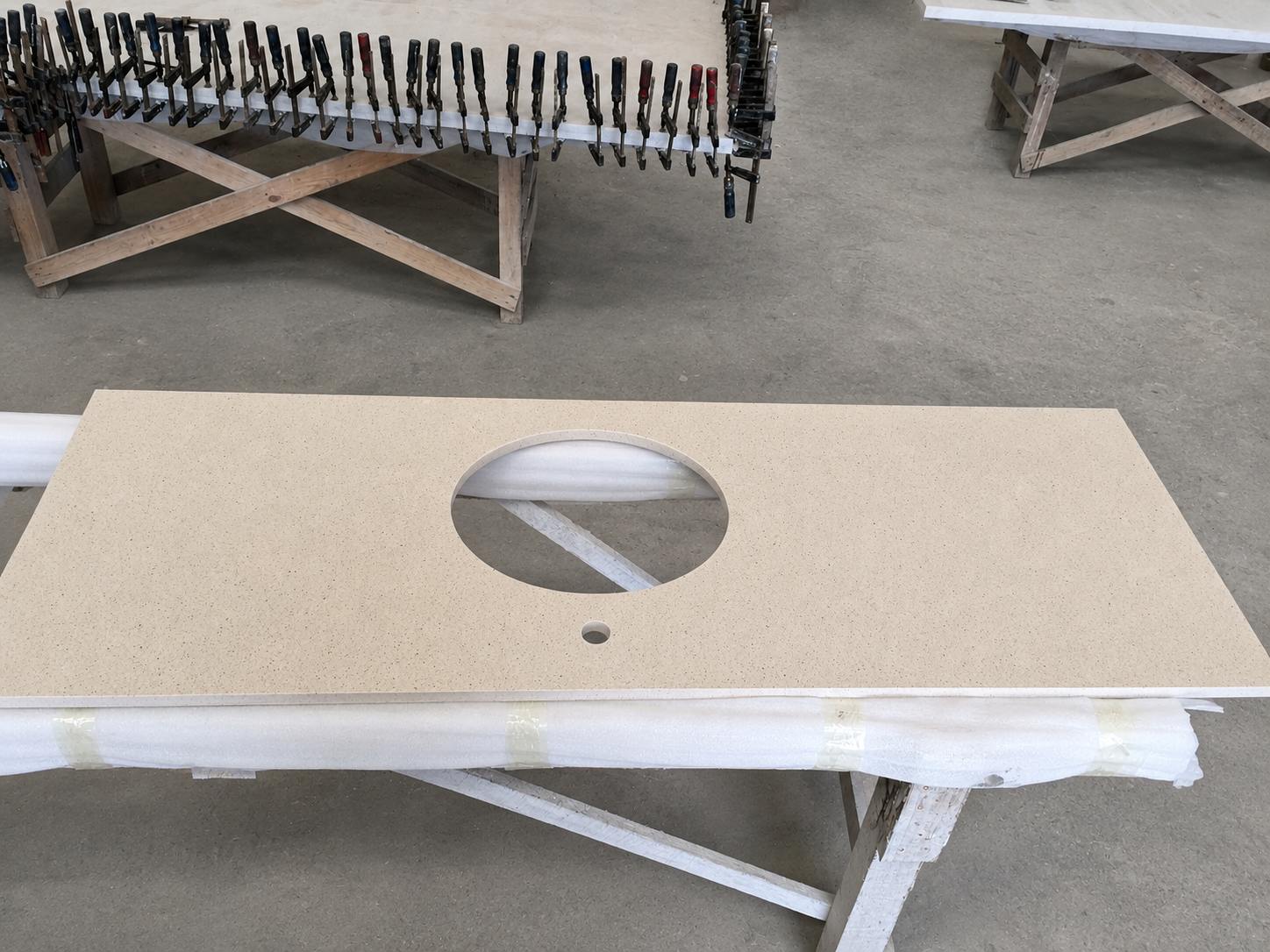 Custom quartz vanity countertop fabricated for a U.S. multifamily project in Aoli Stone factory 