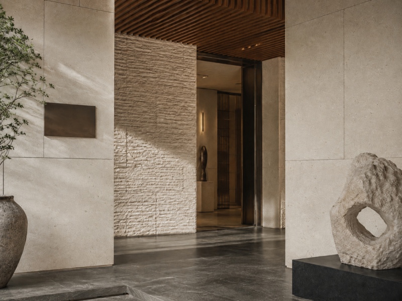 Projeto de revestimento de parede em calcário creme Cotswold para entrada de pátio contemporâneo