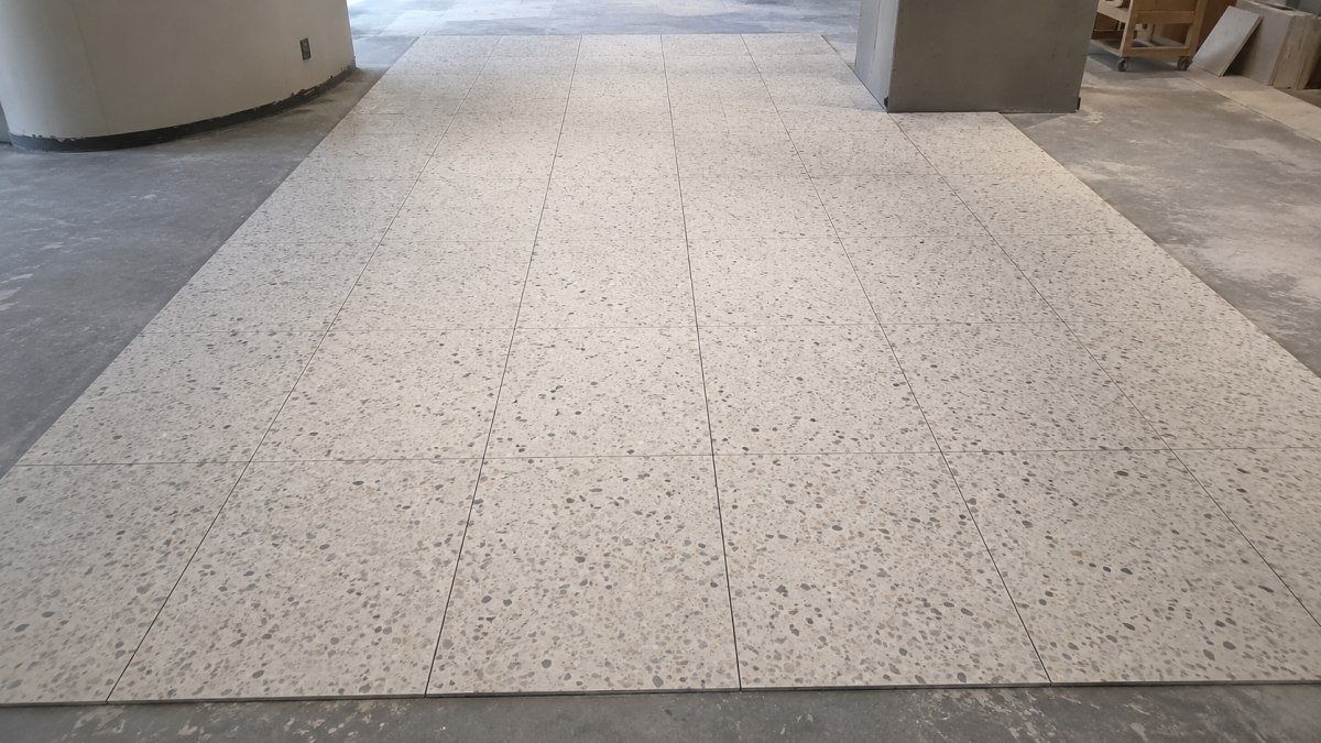repeatable-terrazzo-tile-layout-retail-store Repeatable terrazzo tile layout for a retail flooring material project