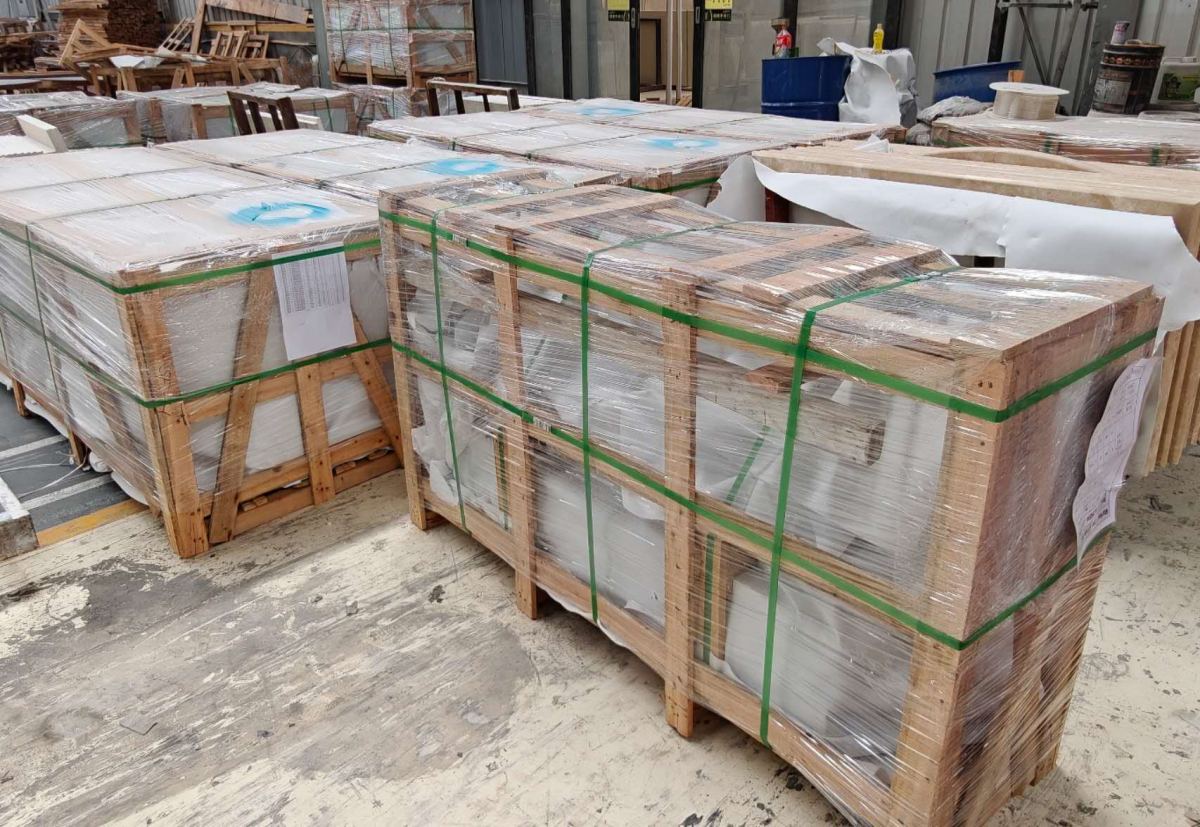Protected Moon Beige limestone panels packed in wooden crates for export shipment